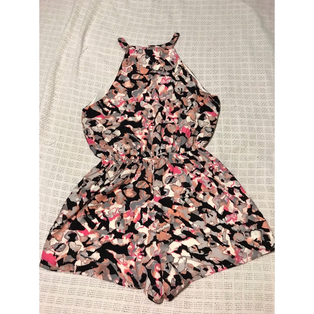 Lady’s pink and black romper size large